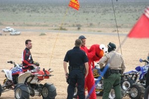 Is the hand on the gun really necessary for Elmo?