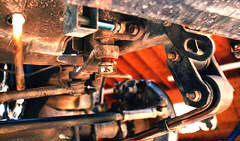 Removing the nut from the steering box shaft. Click for a larger image!