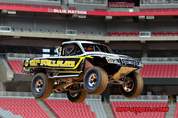 Justin Lofton jumps during media day before the opening round of the 2013 Stadium Super Trucks series. 