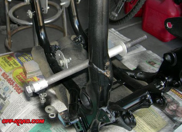 An American 1/2-inch bolt was placed in position for the rear motor mount.