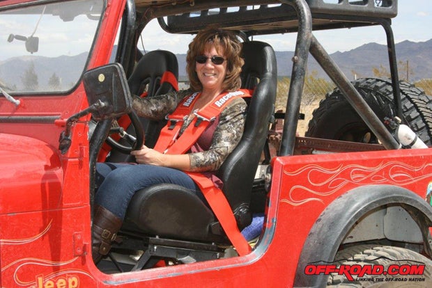 Attractive, safer, and more comfortable, the Summit Racing seats and Racequip safety harnesses are being shown off by club member Tanya.