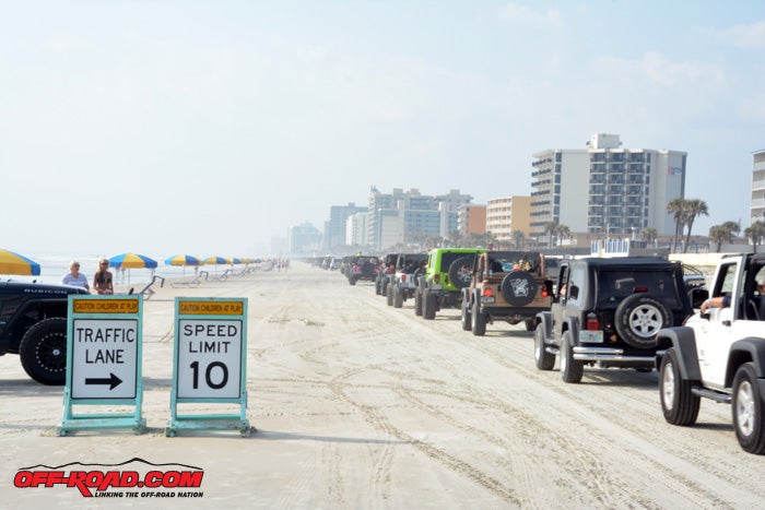 Jeeps cruising Daytona Beach as far as the eye can see.