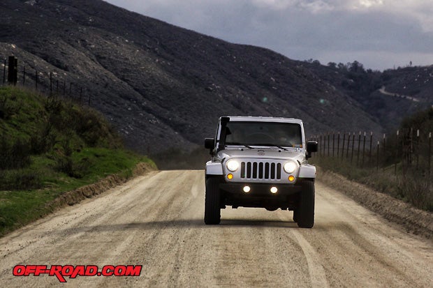 Jeep Wrangler Unlimited JK Sahara equipped with Rugged Ridge XHD snorkel system.