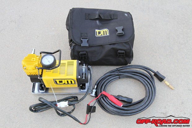 The TJM HD Compressor comes with a carrying case, 24-foot hose for filling and "Alligator Clip" battery connectors. 