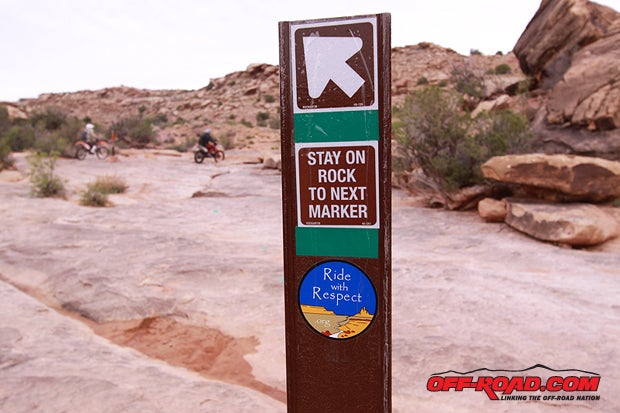 The signage speaks the word: respect the trails and local laws and well get to keep enjoying them.