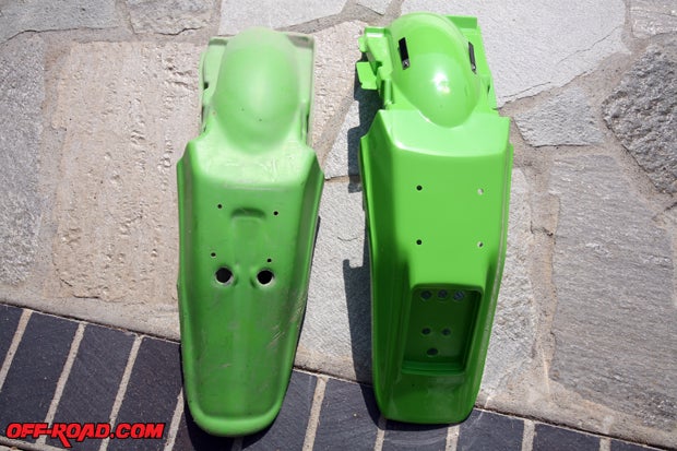The previous owner of the KDX 200 replaced the rear fender with a motocross-style piece (left), but it was held on with mismatched bolts and washers. It was worn and ready to be replaced. We went with a OEM replacement fender from Kawasaki (right).