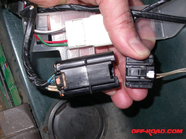 Note the wire alignment in the #2 ground plug as it connects to the existing cabin harness. Those grounds will connect once the inner wire has been shifted to the outermost terminal. If you dont have this option, just find a body ground.