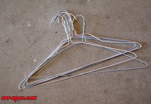 Metal hangars or lengths of copper wire work equally well to hold stuff.