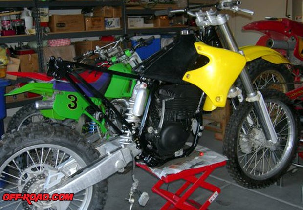 Then to keep things rolling, the gas tank, shrouds, and the aluminum subframe got bolted home.