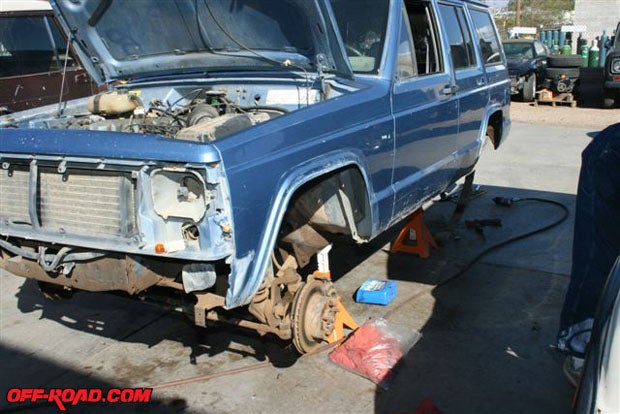 Using the Skyjacker instructions, begin removing the front differential and suspension components.