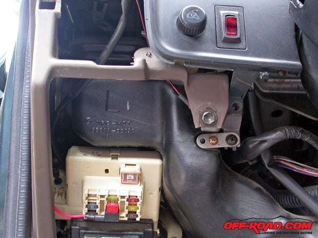 We sourced power for e-locker actuation from an Add-A-Fuse neatly tucked away in the dash fuse panel, which makes routing power to the energizer/cutoff switch (to the left of the steering column) straightforward and simple.