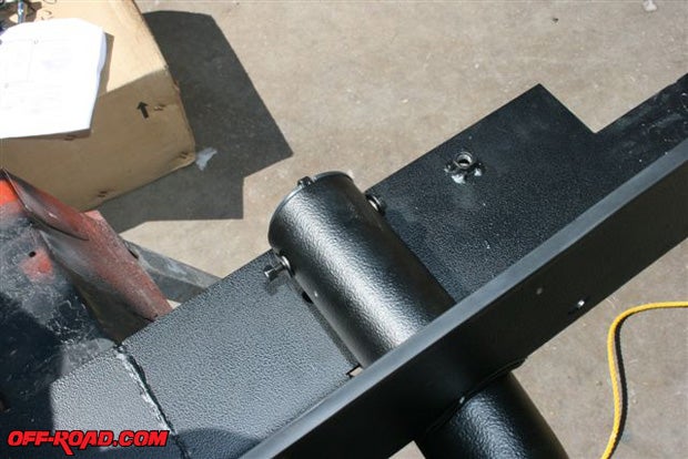 A long bolt and nylock nut secure the step caps. If the nut becomes loose or if a component fails (broken bungee or cap, etc.), it will be necessary to remove the entire Slider Step assembly to repair.