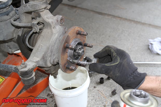 We apply a little anti-seize grease before putting the rotor in place. This will help if you need to remove your rotor in the future.