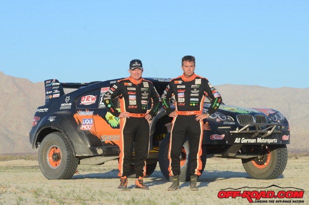 The AGM team of Schwarz (left) and Christensen (right) hope their new Trophy Truck will be in contention on race day at the 1000. Photo: Art Eugenio/GETSOMEphoto