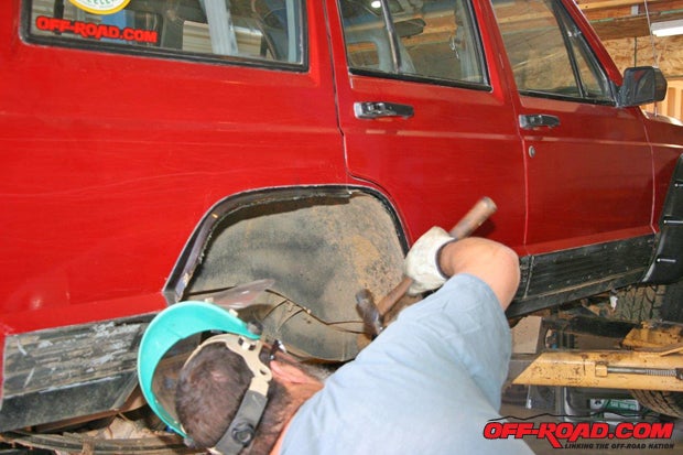 You may also have to massage the inner liners and/or the fenders edges with a hammer, depending on how much trail time your Cherokee has seen.
