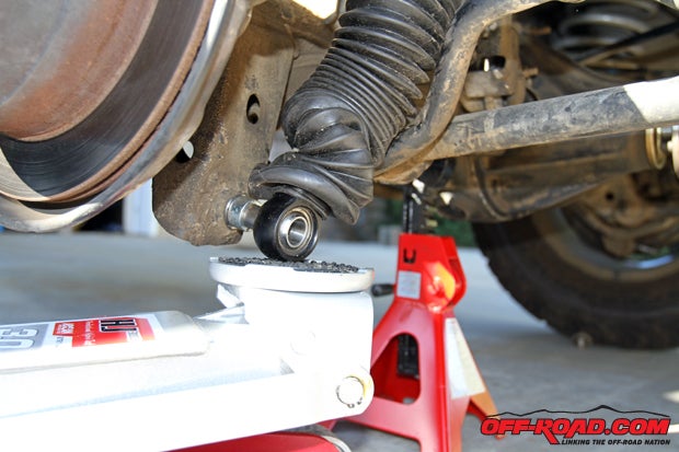 If youre doing this job in the garage or at home in the driveway, one way to help compress the Icon shock and line it up for installation is to use a jack. Of course, make sure you have the vehicle properly and safely secured with jack stands!