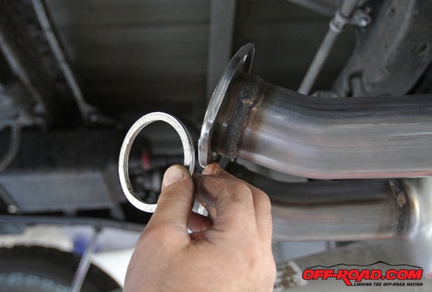 Additional metal gaskets are included to provide a seal between center muffler assembly and the dual tail pipe assemblies. 