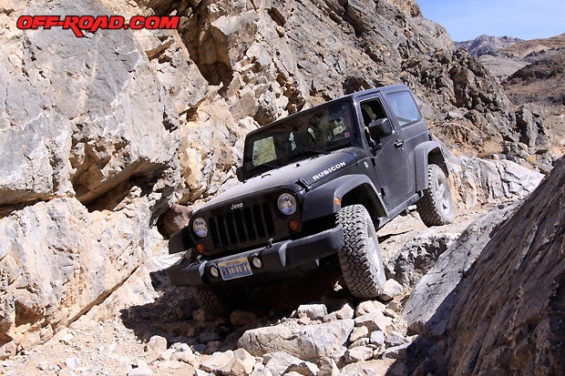 Trish crawled down the rock ledges at Dedeckera Canyon on Steel Pass like a pro. Her new 2012 Jeep Wrangler Rubicon made it look easy.