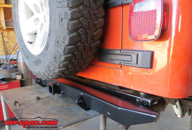 The new Bestop bumper that replaced the older, rusted out steel bumper can be trusted to tow or tug.