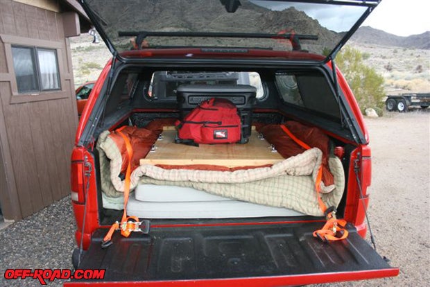 I used a cargo platform that Id built for another project to hold all the camping gear and containers during the trip. The platform allowed me to strap everything down while bouncing across the Mojave Desert.
