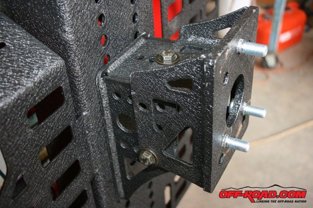 Determine where to locate the adjustable wheel mount plate onto the stationary bracket per the Smittybilt instructions.