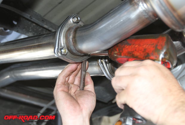 Once the tail pipe assemblies are supported and set it place, the final tightening of the center muffler assembly and rear tail pipes will complete the job. 