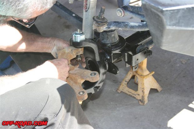 Once the differential gears are set, it can be reattached to the Jeep. At this time the outer equipment can be reinstalled.