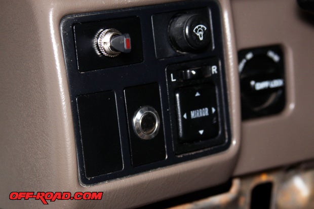 We were able to fit both the On/Off toggle switch and Momentary button into switch plates on the Land Cruisers dash. This gives the installation a factory finish look. A red light on the On/Off toggle switch indicates when the Baja Designs Stealth XPG LED bar is on.