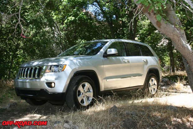 The 2011 Grand Cherokee also looks right at home on a backcountry trail through an abandoned chicken ranch.
