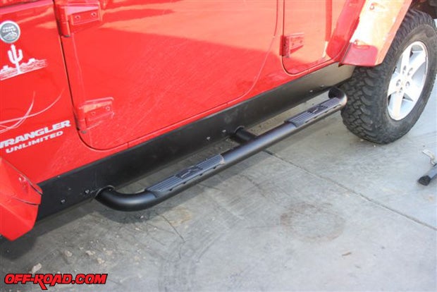 Bestops HighRock Slider Step is in its up or traveling position, which allows it to slide over boulders and other trail obstacles. The rocker panel shield will actually support the weight of the Jeep without damaging the Jeeps body.