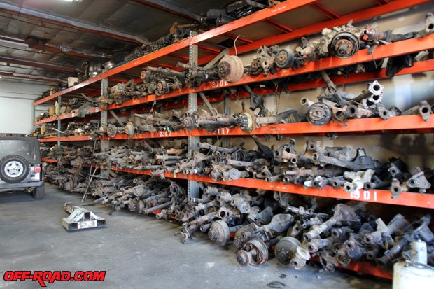 An entire wall in the 10,000-square-foot M.I.T. shop stores a variety of different axle housing of all shapes and sizes.