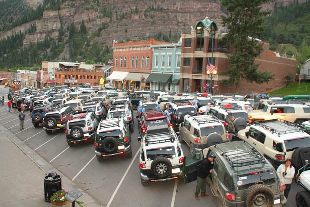 The town's Police Office closed down Main Street so that the FJ Summit crew could wedge all the vehicles six deep in a V shape.for a group photo. They even had a high lift pick the photographers up to get the best shot.