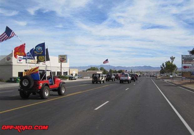 2.	Join a parade! My Jeep is decorated for the recent Veterans Day Parade in Kingman, Arizona. Nearly a dozen club members had fun entertaining the crowds and handing candy out to the children along the parade route.