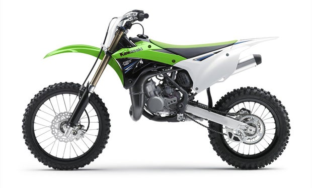 Slimmer radiator shrouds and side panels, a lower seat height and wider handlebars all contribute to improved ergonomics on the 2014 KX100. 
