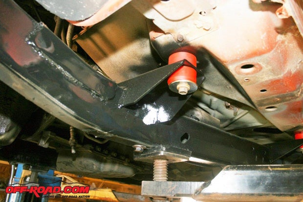 The Jeep’s body also had to be lifted one inch for the TNT Customs suspension. Where it was called for we cut off the OEM body mounts so the TNT-supplied body mounts could be installed. Most body-lift kits use thicker bushings, which accelerate wear and tear to the bushings, whereas the TNT Customs’ mounts are raised to lift the body off the frame. We used stock-height neoprene bushings from Summit Racing in place of the 10-year-old OEM bushings.