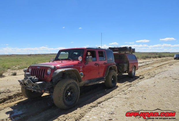 A deeply rutted, muddy road in New Mexico slowed but couldnt stop the Rubicon and Budget Trailer with the CVT rooftop tent.