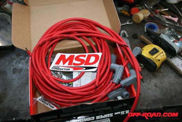 The MSD cables in the kit we used were not precut. The distributor side connectors were mounted at the factory, but not the spark plug connectors.