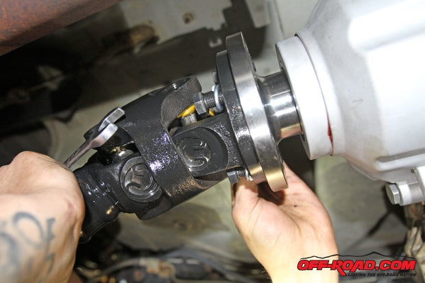 With the transfer case back together, our new Tom Woods drive shaft is ready for installation on the output flange.