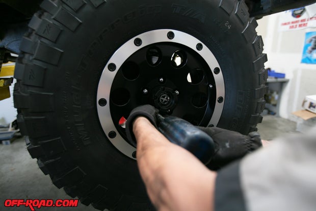 When we reinstalled the new tire-and-wheel combo, we also used new locking lug nuts for a little added security.