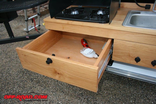 The galley also contains a drawer that locks during travels.