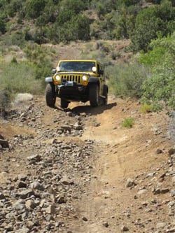 Without lockers and low air pressure, a steep trail like this one could require the Jeep to winch its way out.
