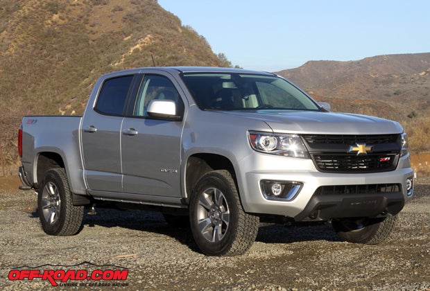 The all-new 2015 Chevy Colorado features sleek, sporty styling. For our test Chevrolet removed the air damn from the bottom of the front bumper, because although it aids in fuel economy it reduces ground clearance significantly for off-highway use.