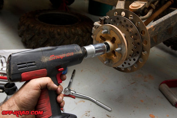 Using a good impact wrench will lesson the hassle of removing the nut.
