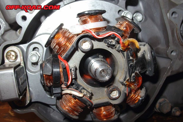 Here is a sample of what a stator looks like once the side cover has been removed from the engine. In some dirt bike models, pulling the flywheel is also necessary, like on this two-stroke KTM 380 built by Eric Tabb on Off-Road.com.  For more on Erics bike, search keyword Project Old School KTM.