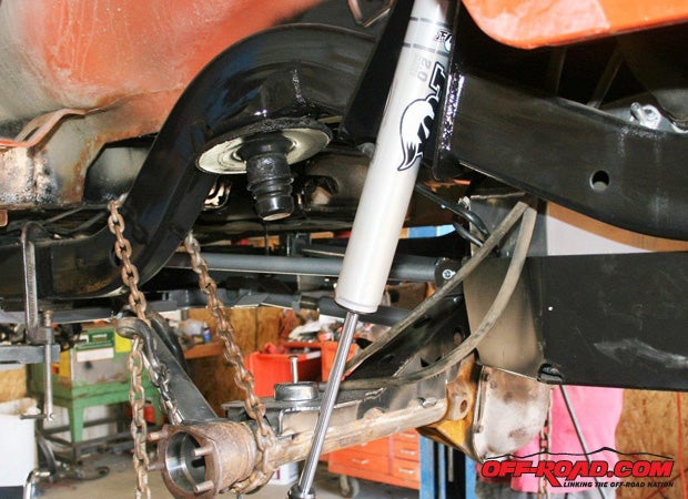 Now is the time to reinstall the rear differential. Connect all four control arms to their mounts on the rear differential’s TNT-supplied truss.