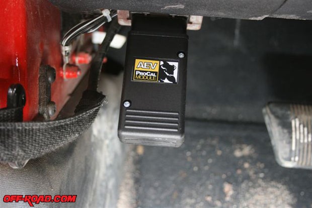 The AEV ProCal Module attaches to the OBII computer port under the drivers dash in the JK. It can control several engine and chassis functions. The included pamphlet provides all the instructions on how to set the various functions in the vehicles computer.