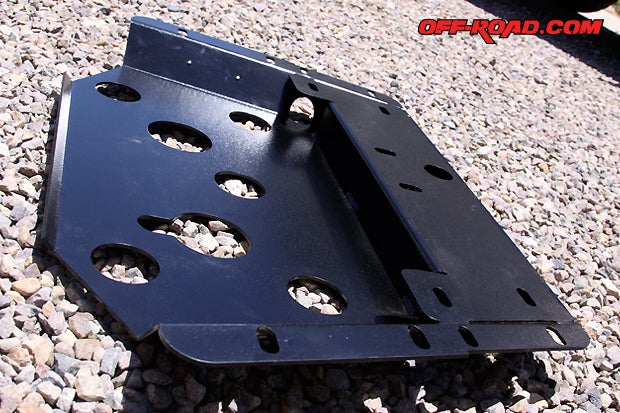Holes along the flat surface on the Slee Belly Pan facilitate fluid draining without the need to remove the skid plate. They also add airflow for heat dissipation. In addition, the plate features no exposed hardware on the bottom surface to prevent damaging bolts when sliding over rocks.