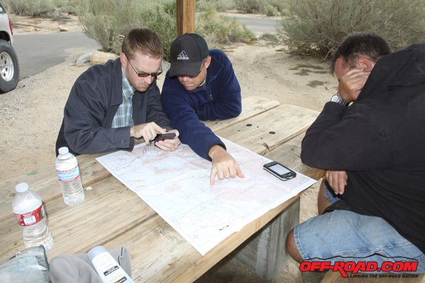Dave and Matt pore over the map, charting a route for our final day. Dans catching a few winks.