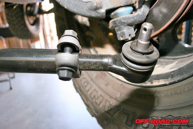 The Rugged Ridge heavy-duty steering kit included much stronger tie rod ends and clamps. Thread the ends into the tie rod or drop link until there is about an inch of threads is left.
