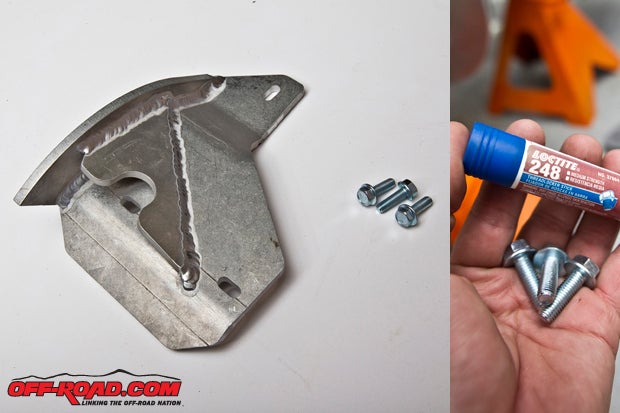 Our next goal was to get the TCS Motorsports Shark Fin into position on the bottom of our TRX450R swinger. Using the three supplied flange head bolts with some blue Loctite, the TCS Shark Fin would help us protect our rear rotor from trail damage and debris. 